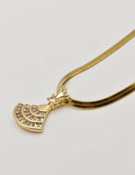 close up of gold fan pendant necklace with cubic zirconia accents, minimalist pendant necklace canada jewellery