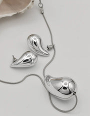 molten_pebble_silver_duo_set_artistic_silver_drop_necklace_and_earrings_montreal
