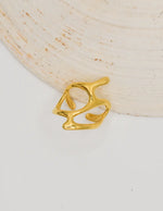 Stylish adjustable gold ring with sculpted curves, minimalist fashion accessory Canada