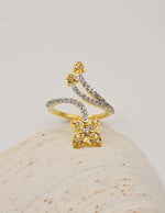 Montreal-inspired floral ring with heart-shaped tips and leaf motif