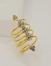 Silver heart eternity ring resting on a white surface, showcasing its delicate pavé details