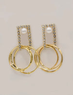 elegant dangling earrings with pearls and gold circle hoops, perfect statement jewellery Canada for weddings and parties