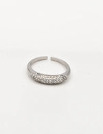 Silver pavé engagement ring on white background