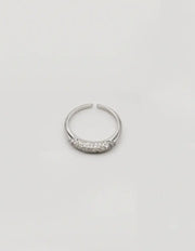 Minimalist engagement ring styled with other jewellery