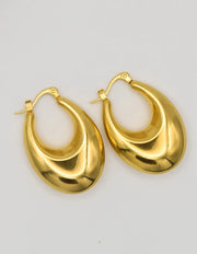 modern oval hoops trending in Canadian clean girl fashion


