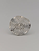 Montreal minimalist jewellery ring styled with white shell