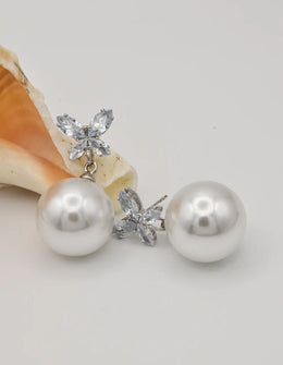 )crystal_butterfly_pearl_earrings closeup view montreal jewellery canada