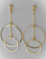 Shiny gold double hoop earrings with a smooth finish, ideal for everyday outfits.

