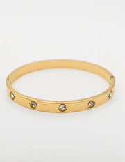 Gold crystal bracelet with round bezel-set stones