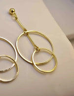 Timeless gold-plated double hoop earrings with a light, airy design for women.

